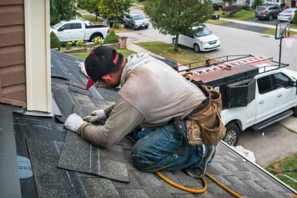 Professional Roofing technician working in Agency, MO